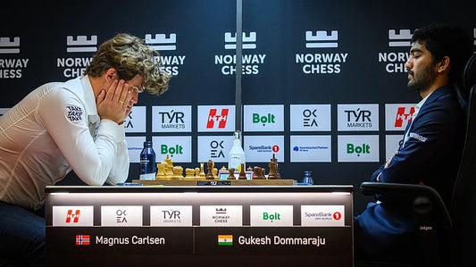 ** Gukesh Stuns Carlsen With First Classical Chess Win